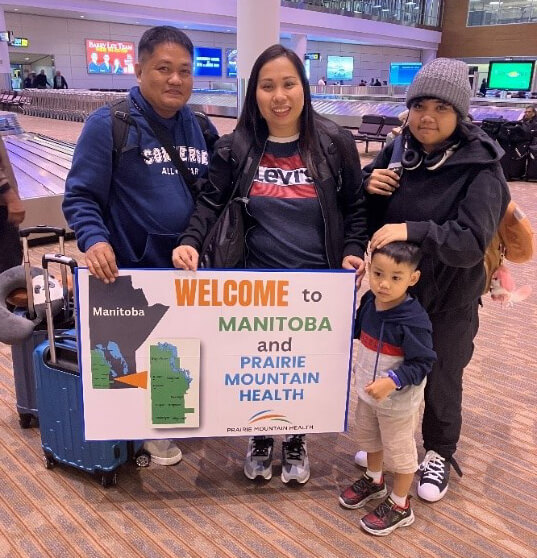 Ariane Jadraque, a registered nurse destined for Swan River, arrived with her family at Winnipeg International Airport on Sept. 9  She is pictured with her family members who include husband  Jenneson Jadraque, daughter Elisha and son Jansen.